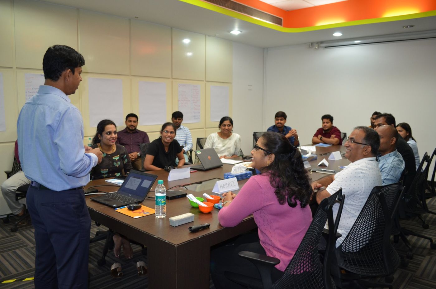 Participants laughing during a soft-skills workshop