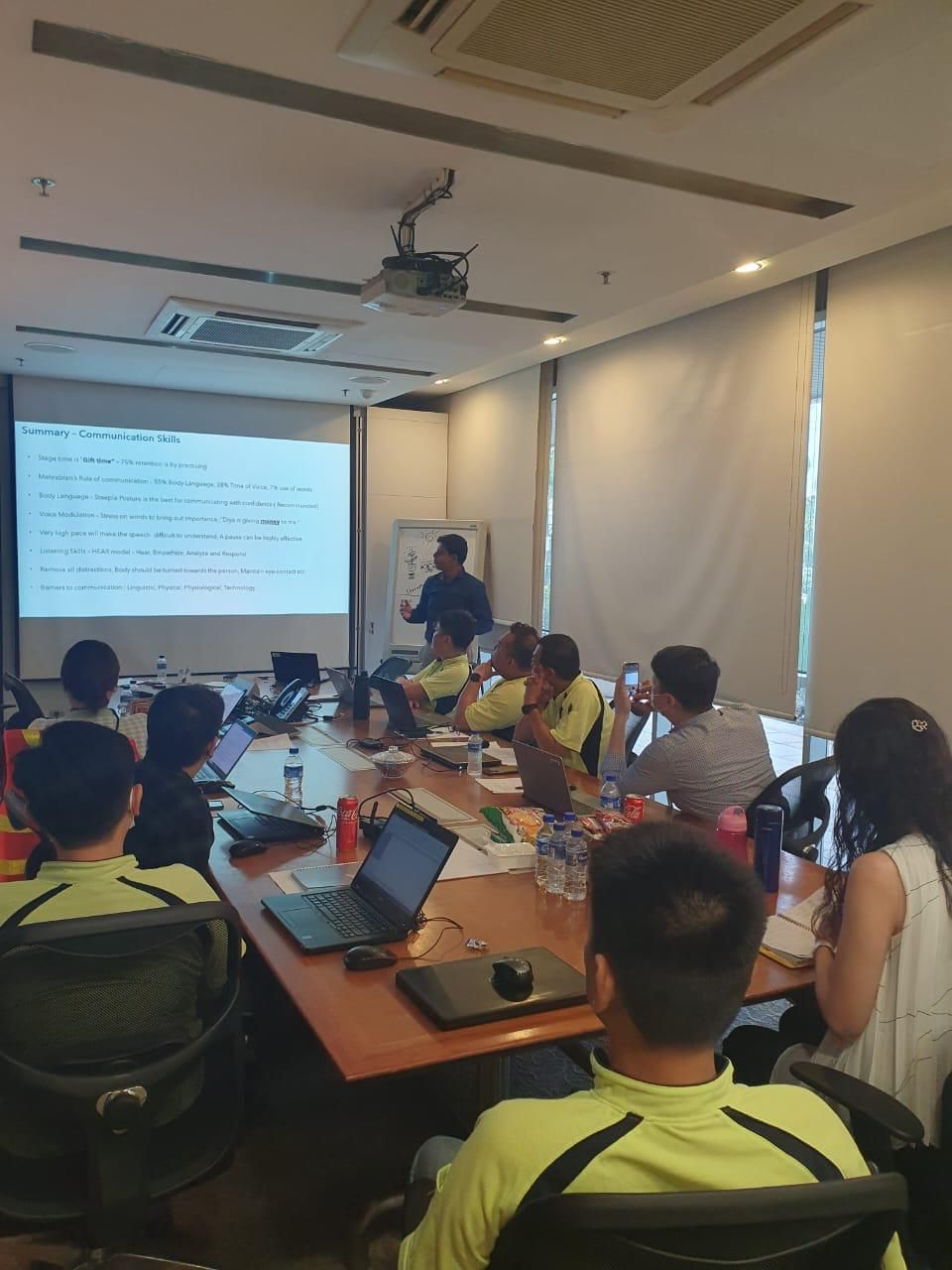 Communication skills session with slides on screen